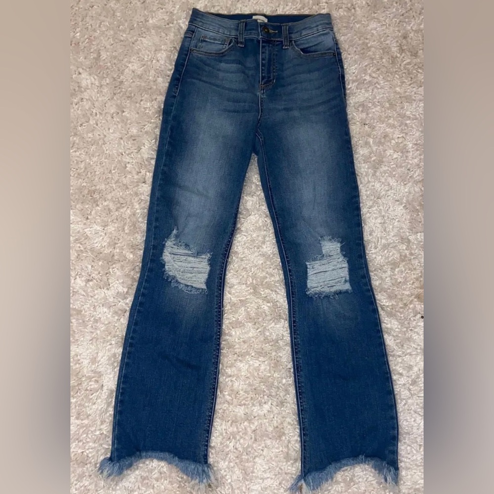 Sneak peek light wash ripped jeans